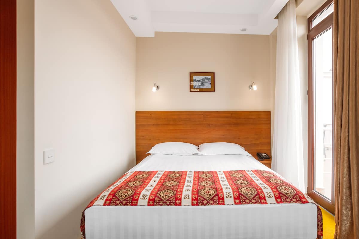 1 habitación, ropa de cama de alta calidad, minibar y escritorio