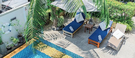 Outdoor pool, open 7 AM to 8 PM, pool umbrellas, sun loungers