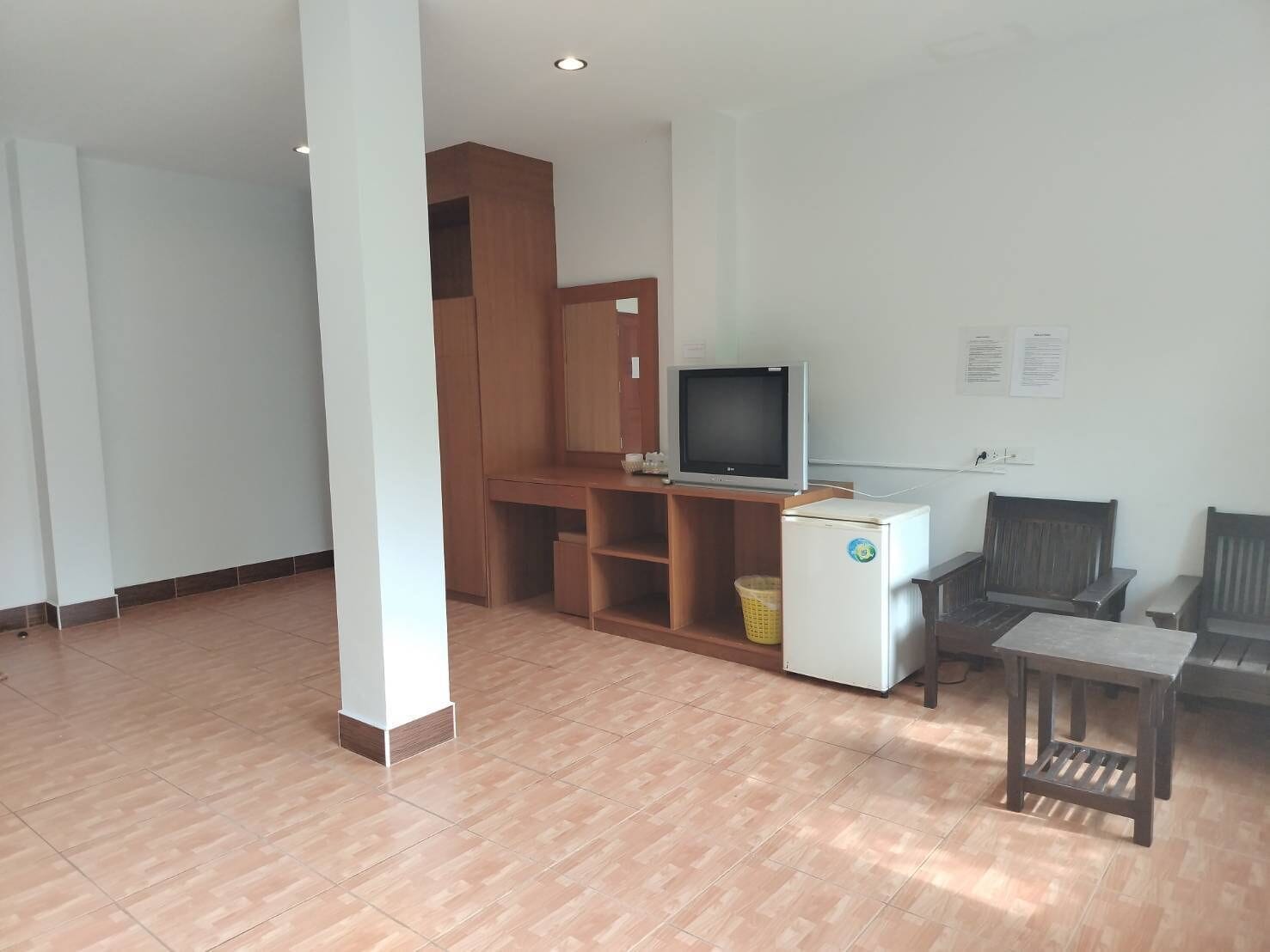 family room, 2 bedrooms, garden view | living area | 21-inch tv with satellite channels