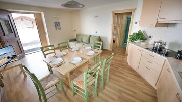 Apartment, 2 Bedrooms | Living area | 32-inch flat-screen TV with digital channels, TV