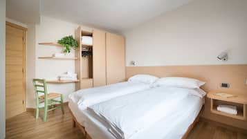 Apartemen, 2 kamar tidur | 1 kamar tidur dan selimut bulu angsa
