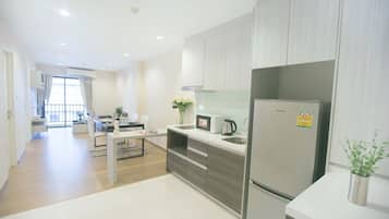 2 Bedroom Superior | Living area | 32-inch LCD TV with cable channels, TV