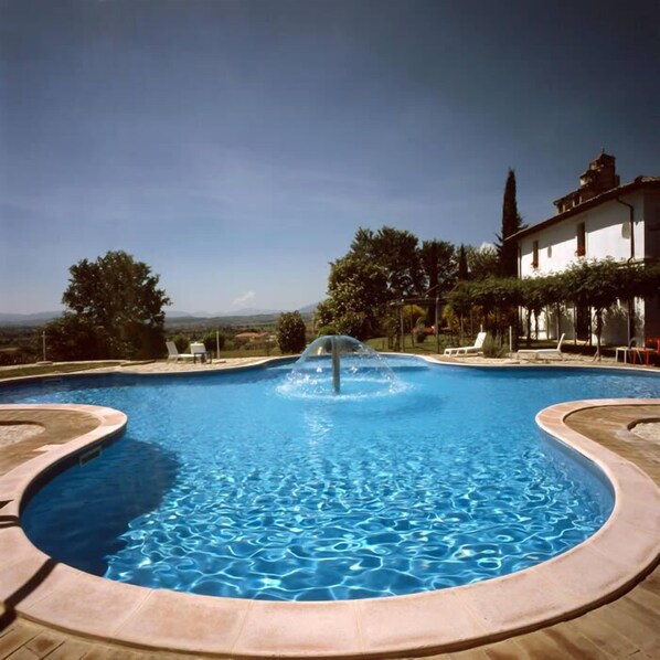 Seasonal outdoor pool, pool umbrellas, pool loungers