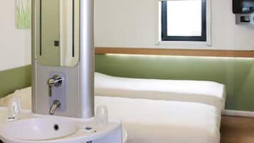 Een bureau, geluiddichte muren, gratis wifi, beddengoed