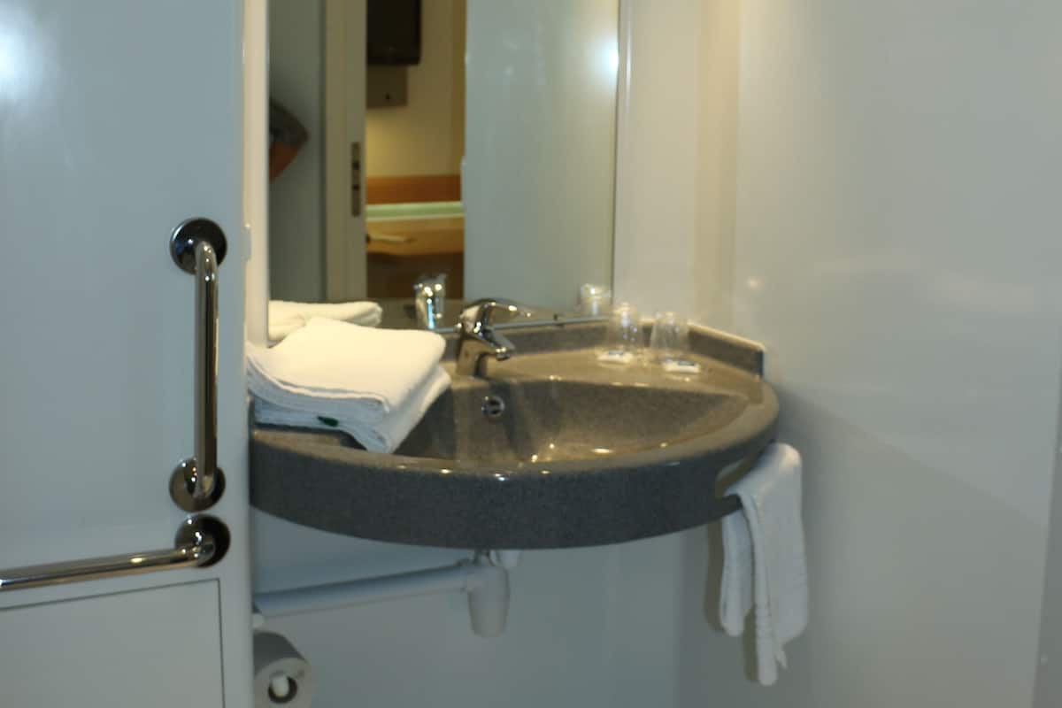 shower, eco-friendly toiletries, hair dryer, towels