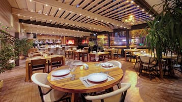 Breakfast, lunch, dinner served; international cuisine, garden views