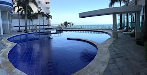 Outdoor pool, open 9:00 AM to 7:00 PM, sun loungers