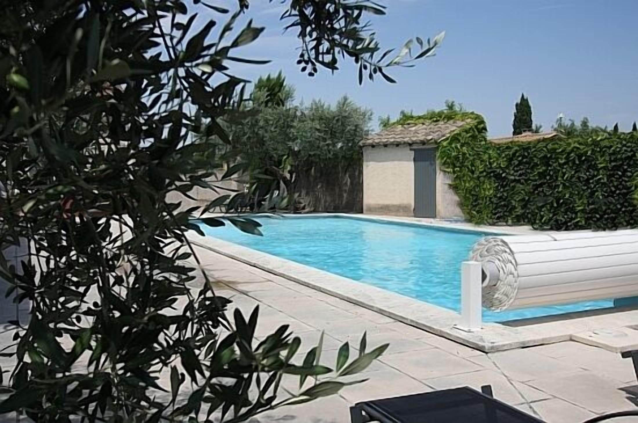 Seasonal outdoor pool, pool loungers