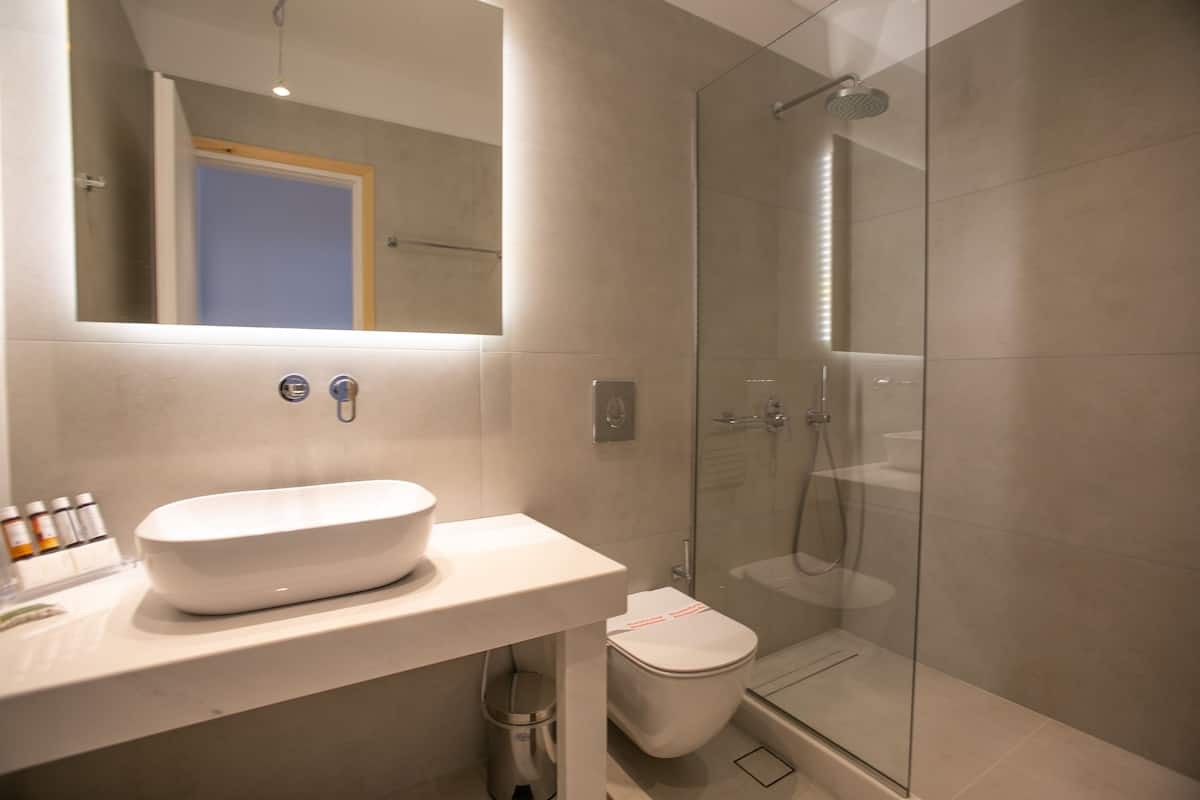 shower, rainfall showerhead, designer toiletries, hair dryer