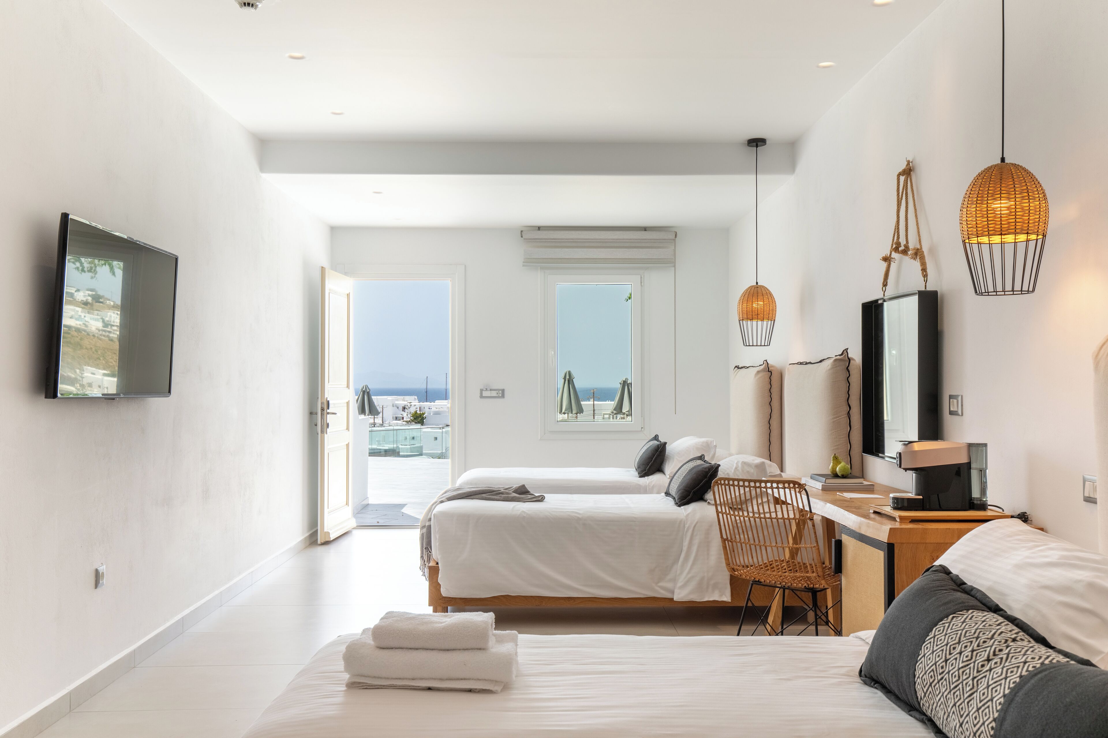 deluxe quadruple room, 1 bedroom, sea view | 2 bedrooms, premium bedding, in-room safe, desk