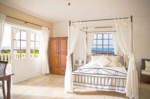Suite, Beach View, Ground Floor | 1 bedroom, minibar, individually decorated, individually furnished