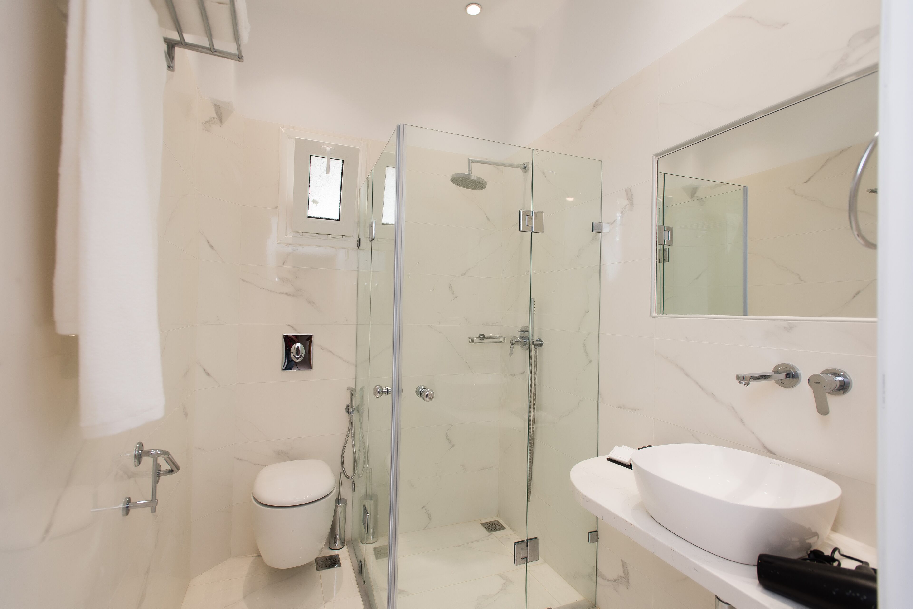 triple room | bathroom | rainfall showerhead, free toiletries, hair dryer, towels