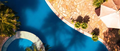 Outdoor pool, pool umbrellas, sun loungers