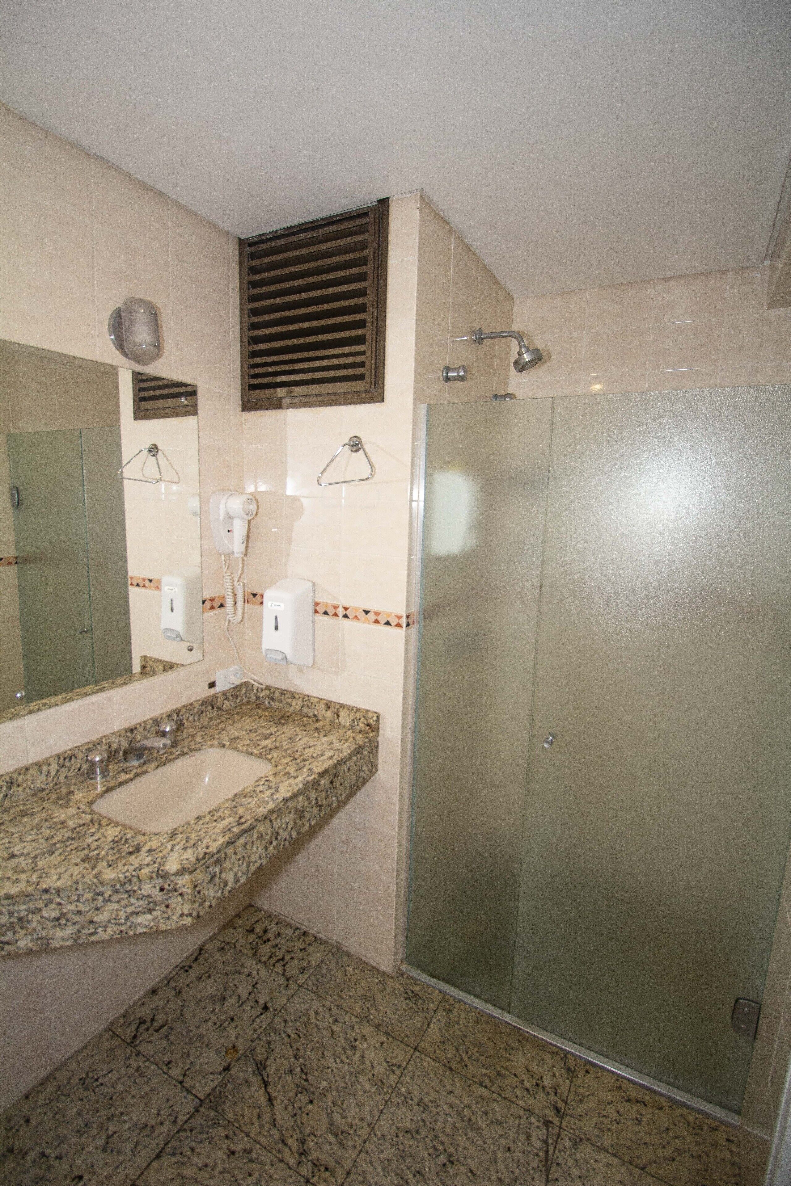 shower, free toiletries, hair dryer, towels