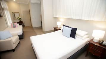 Studio Family Suite (1 Queen Bed and 1 Single Bed) | 1 bedroom, in-room safe, desk, iron/ironing board