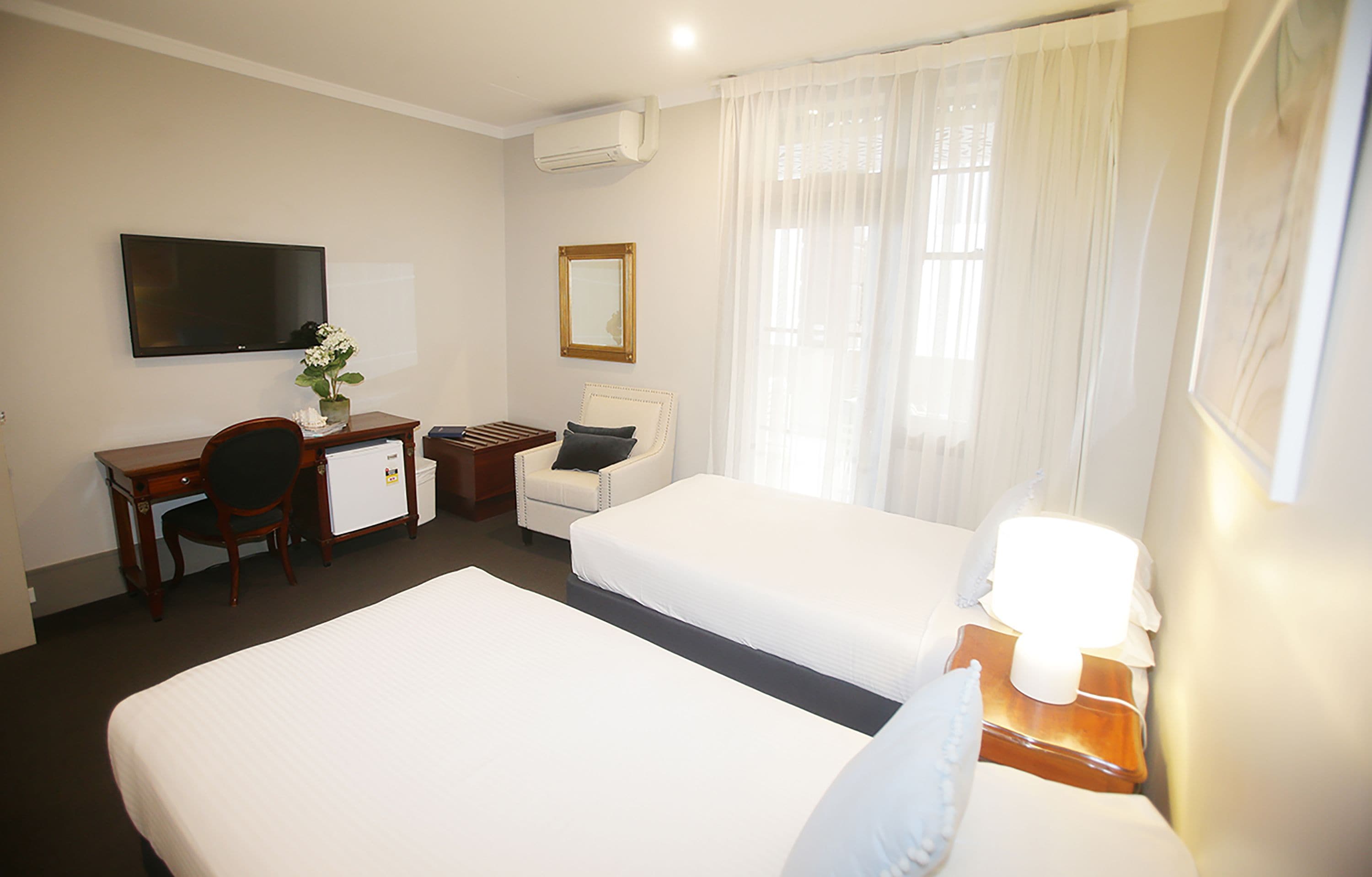 standard twin room | 1 bedroom, in-room safe, desk, iron/ironing board