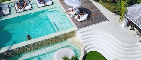 Outdoor pool, pool umbrellas, pool loungers