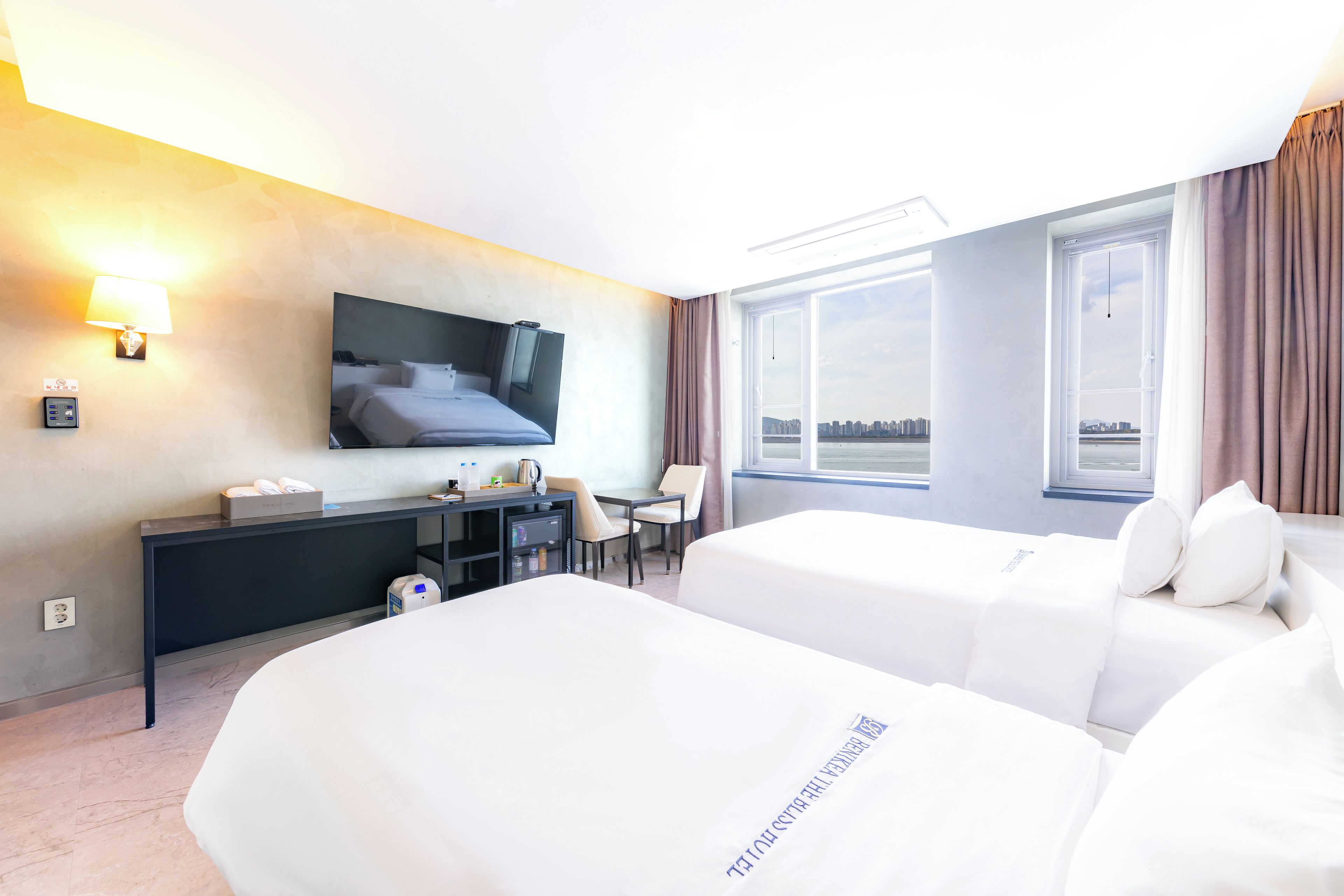 desk, blackout curtains, free wifi, bed sheets