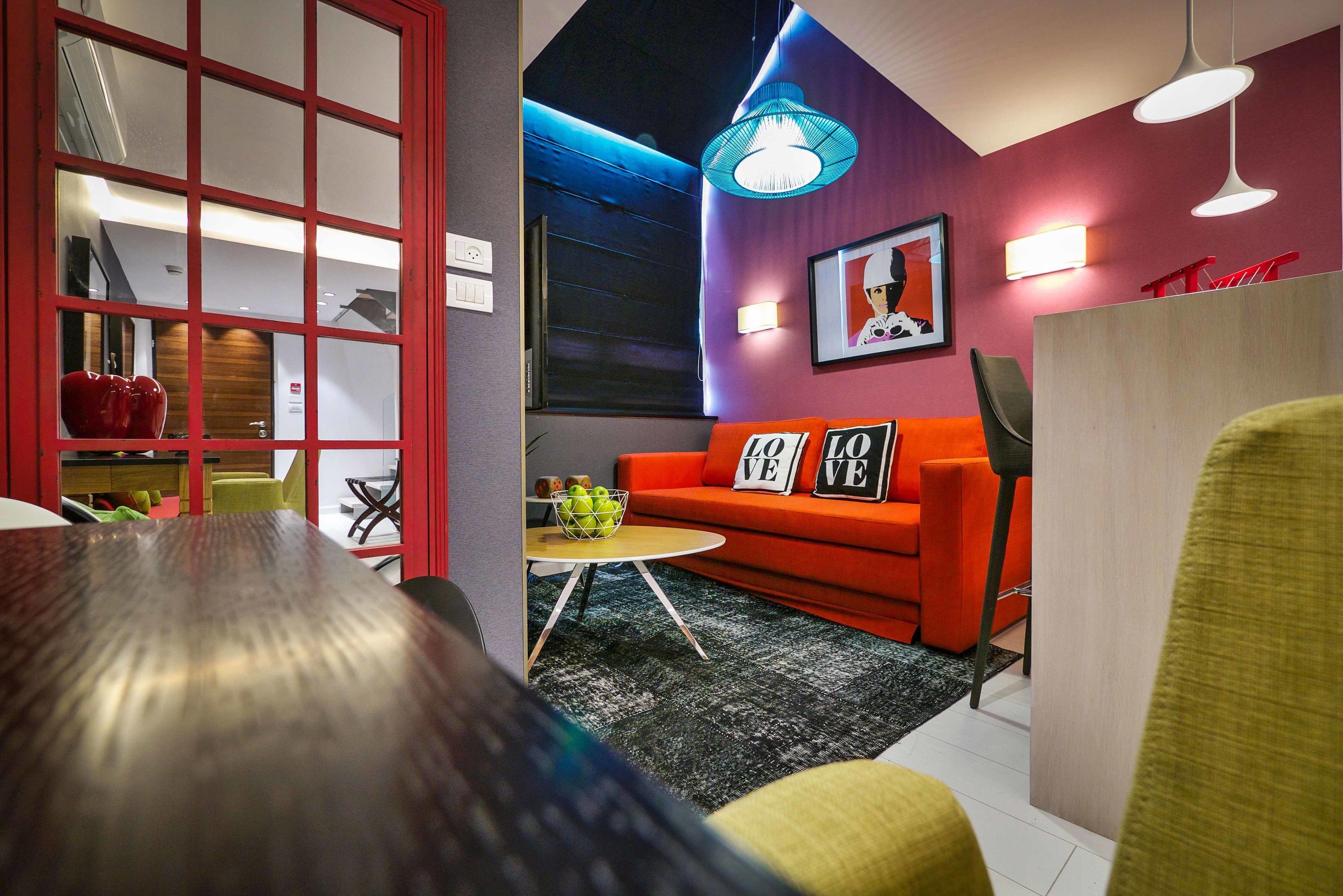 suite (platinium duplex) | living area | 35-inch lcd tv with cable channels, tv, video game console