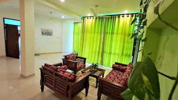 Apartment With Garden View | Living area