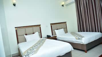 Premium bedding, pillow-top beds, minibar, in-room safe