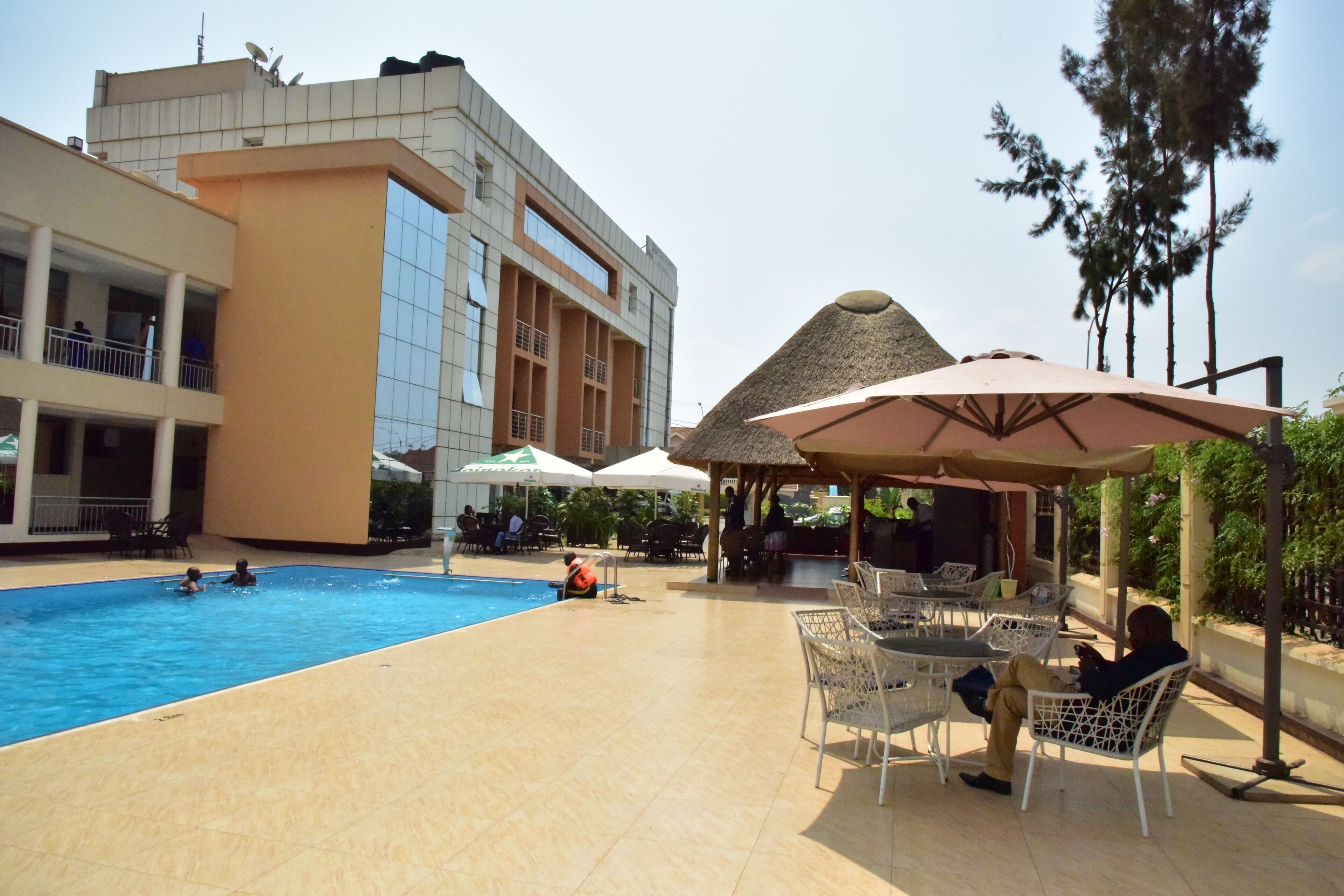 Outdoor pool, pool umbrellas, sun loungers
