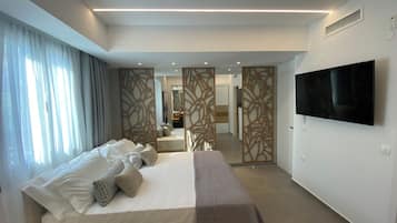 Suite Luxury | 1 camera, biancheria da letto di alta qualità, copriletto in piuma