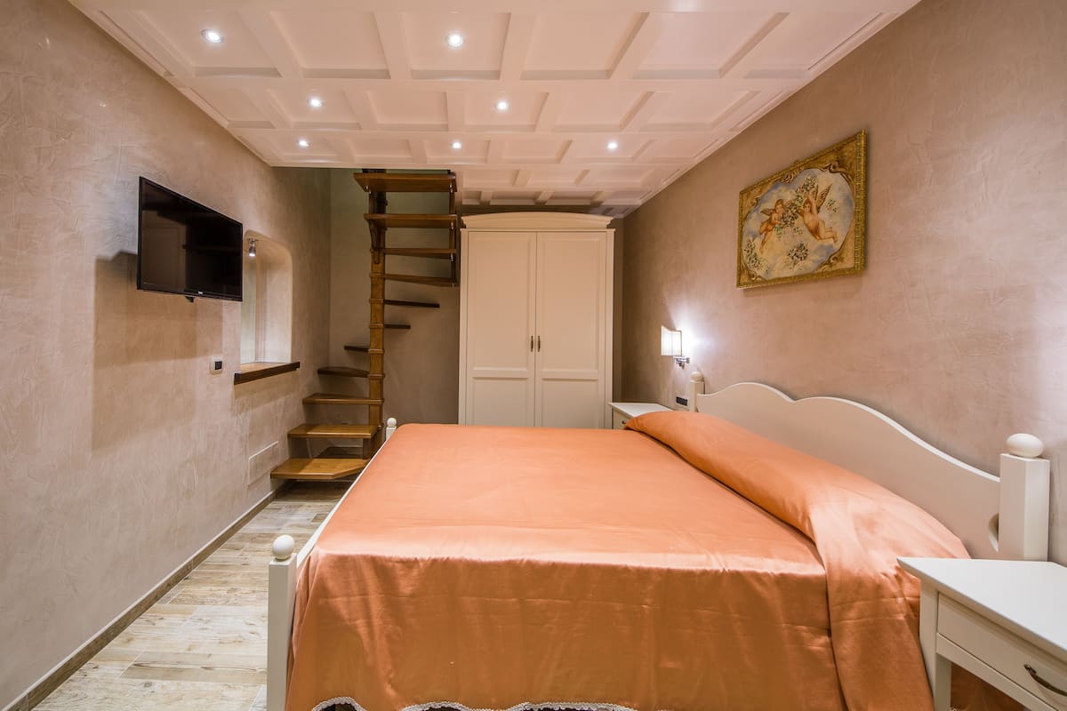 Luxe appartement, meerdere bedden, uitzicht op tuin | 1 slaapkamer, lakens van Egyptisch katoen, luxe beddengoed