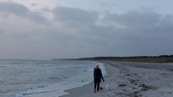 On the beach, white sand