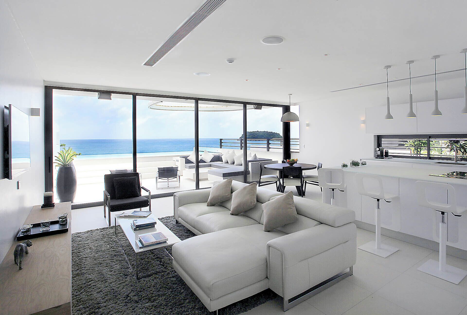 one bedroom sky pool villa | living area | 40-inch lcd tv with satellite channels, tv, pay films