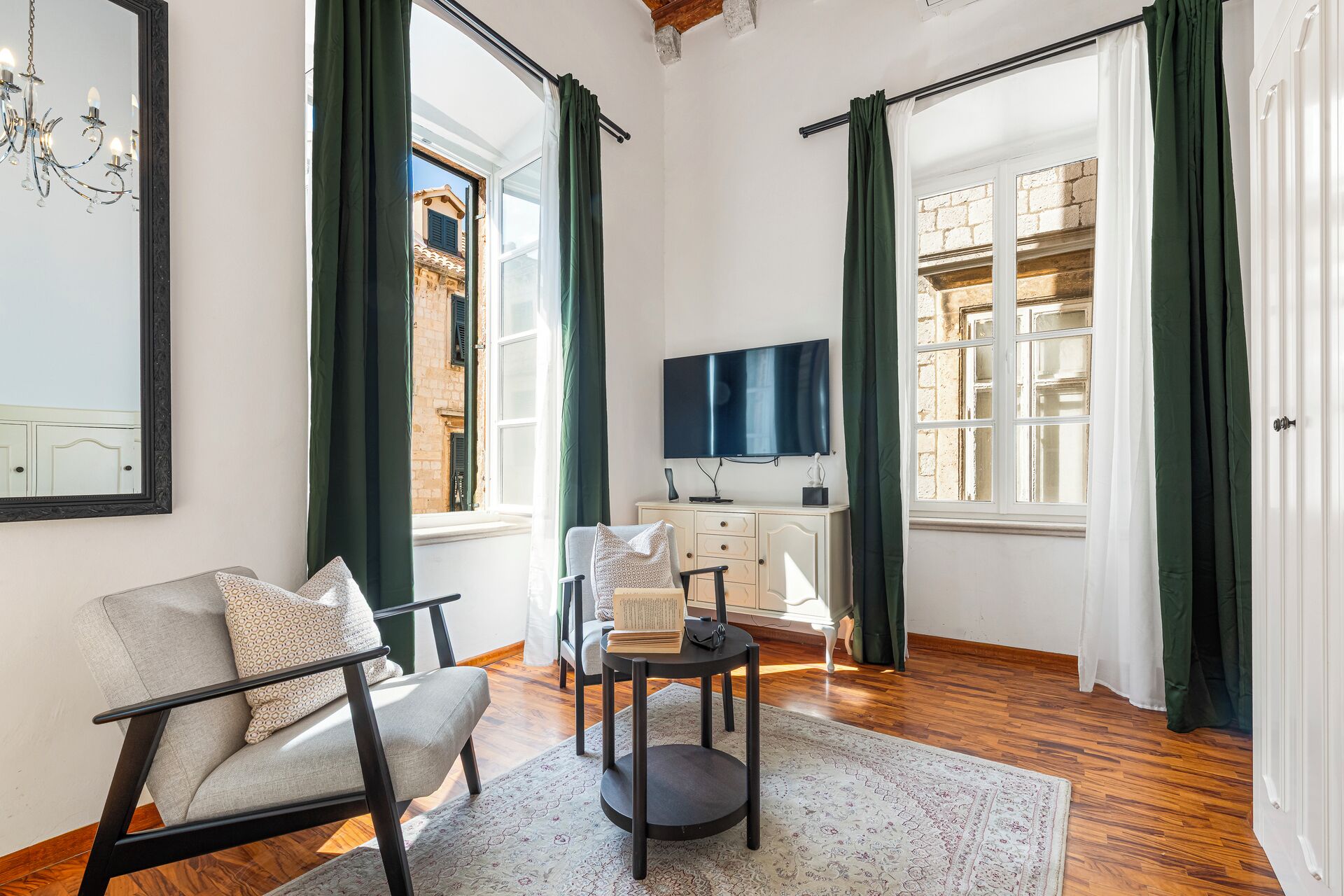 Deluxe Suite, City View | Living area | TV, DVD player