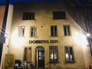 A building with the sign 'Dobbins Inn' indicating a hotel. - Dobbins Inn (Carrickfergus)