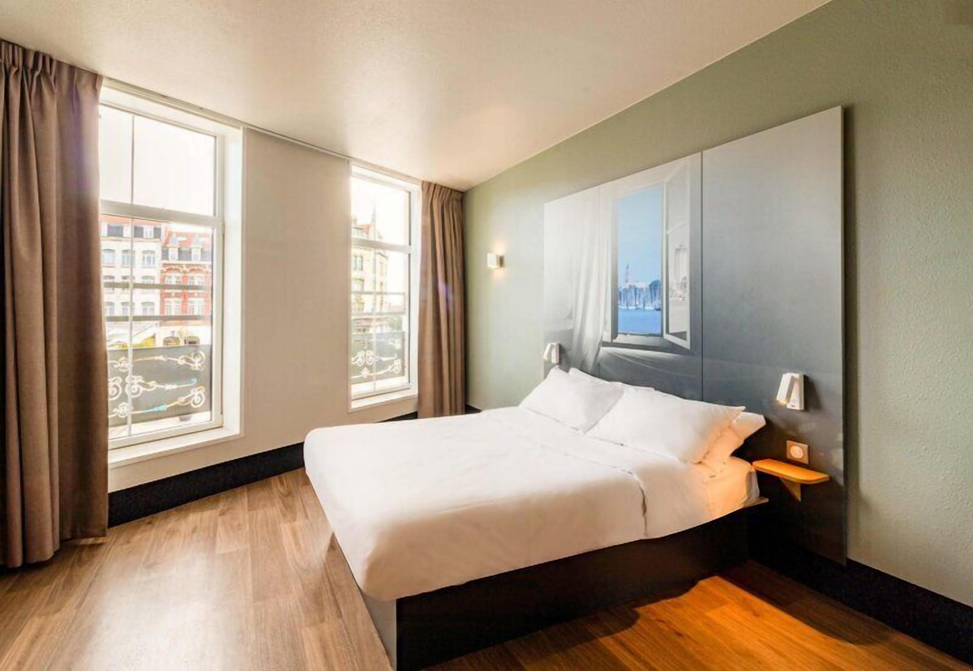Premium bedding, desk, laptop workspace, soundproofing