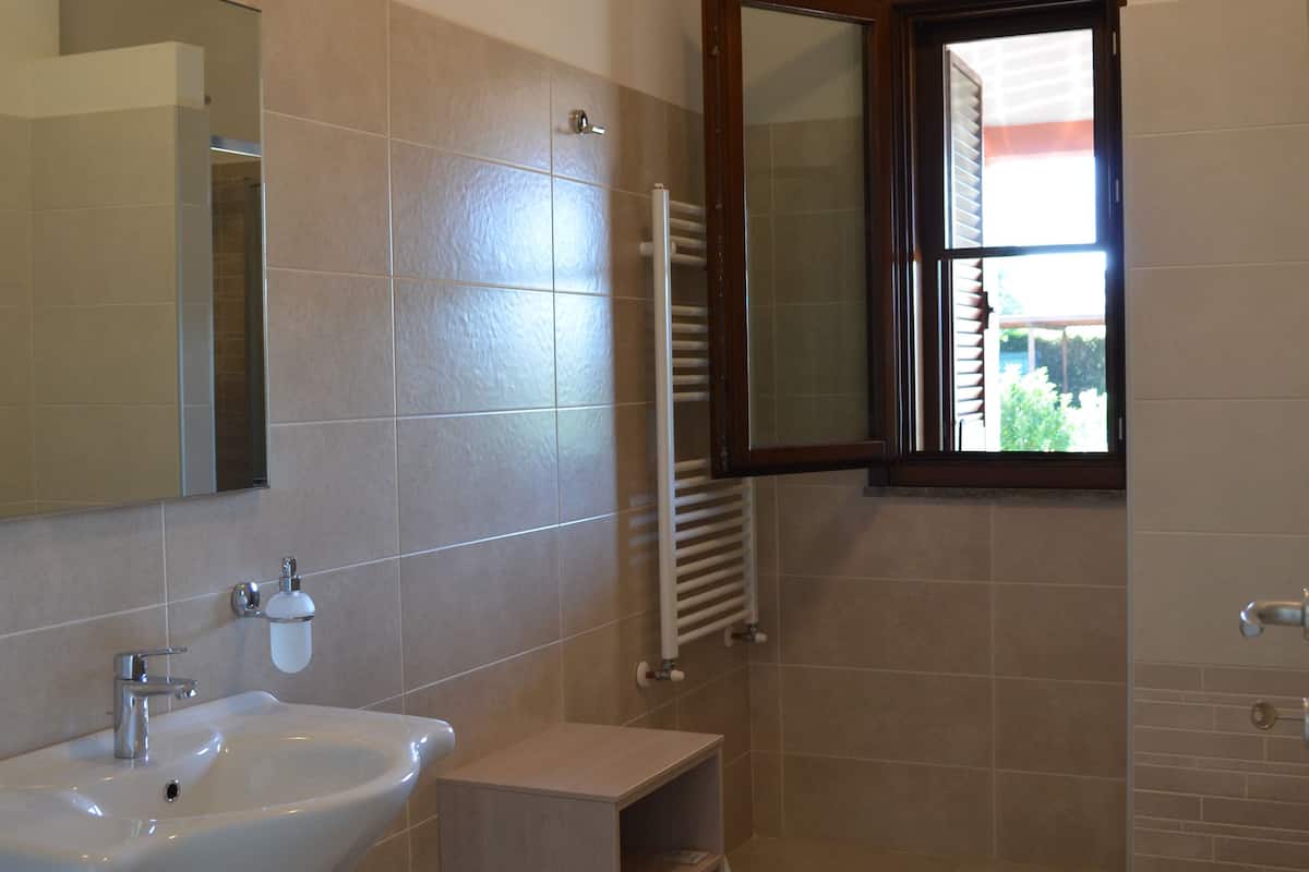 superior room | bathroom | shower, rainfall showerhead, hair dryer, bidet
