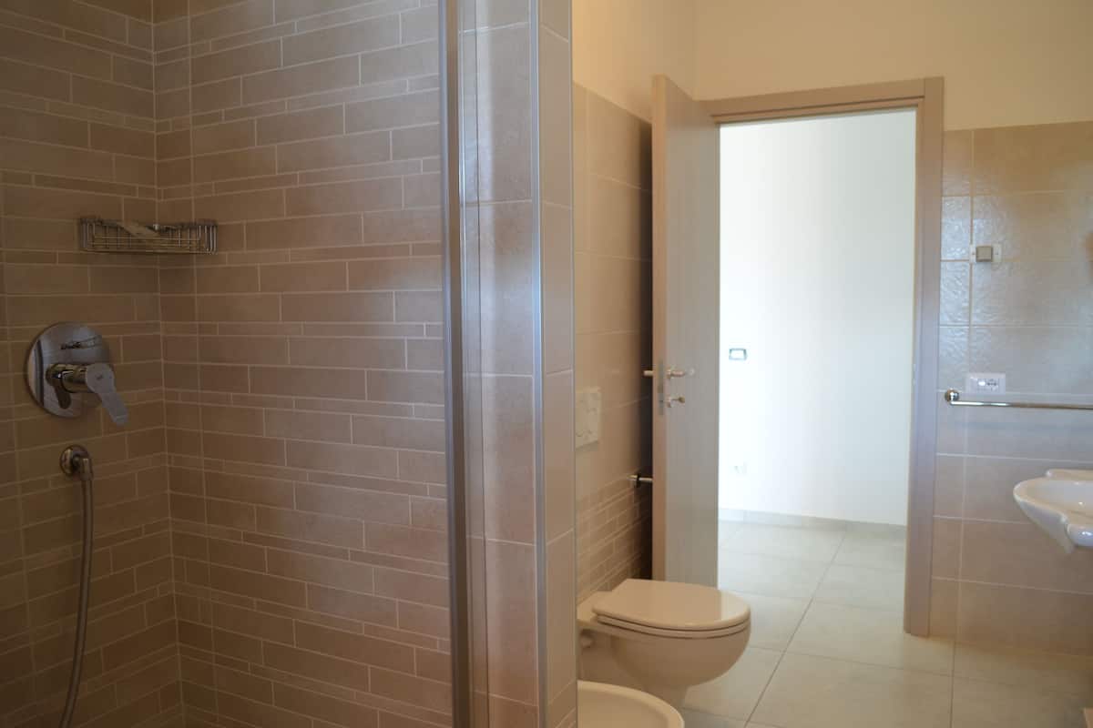 superior room | bathroom | shower, rainfall showerhead, hair dryer, bidet
