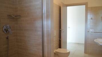 Superior Room | Bathroom | Shower, rainfall showerhead, hair dryer, bidet