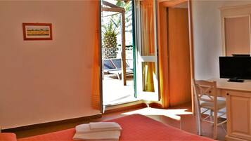 Desk, laptop workspace, free WiFi, bed sheets