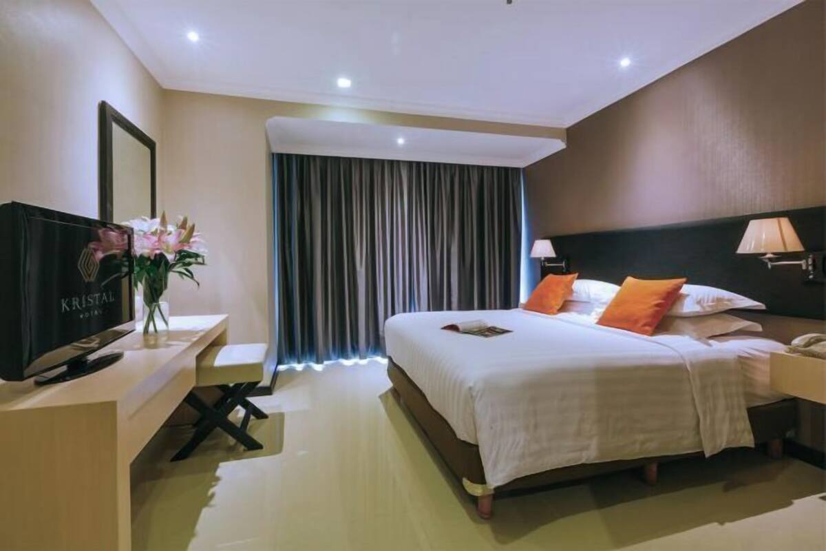 1 kamar tidur, seprai premium, minibar, dan brankas