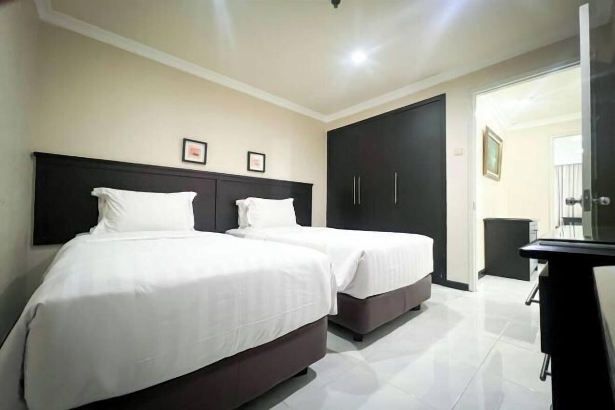 1 kamar tidur, seprai premium, minibar, dan brankas