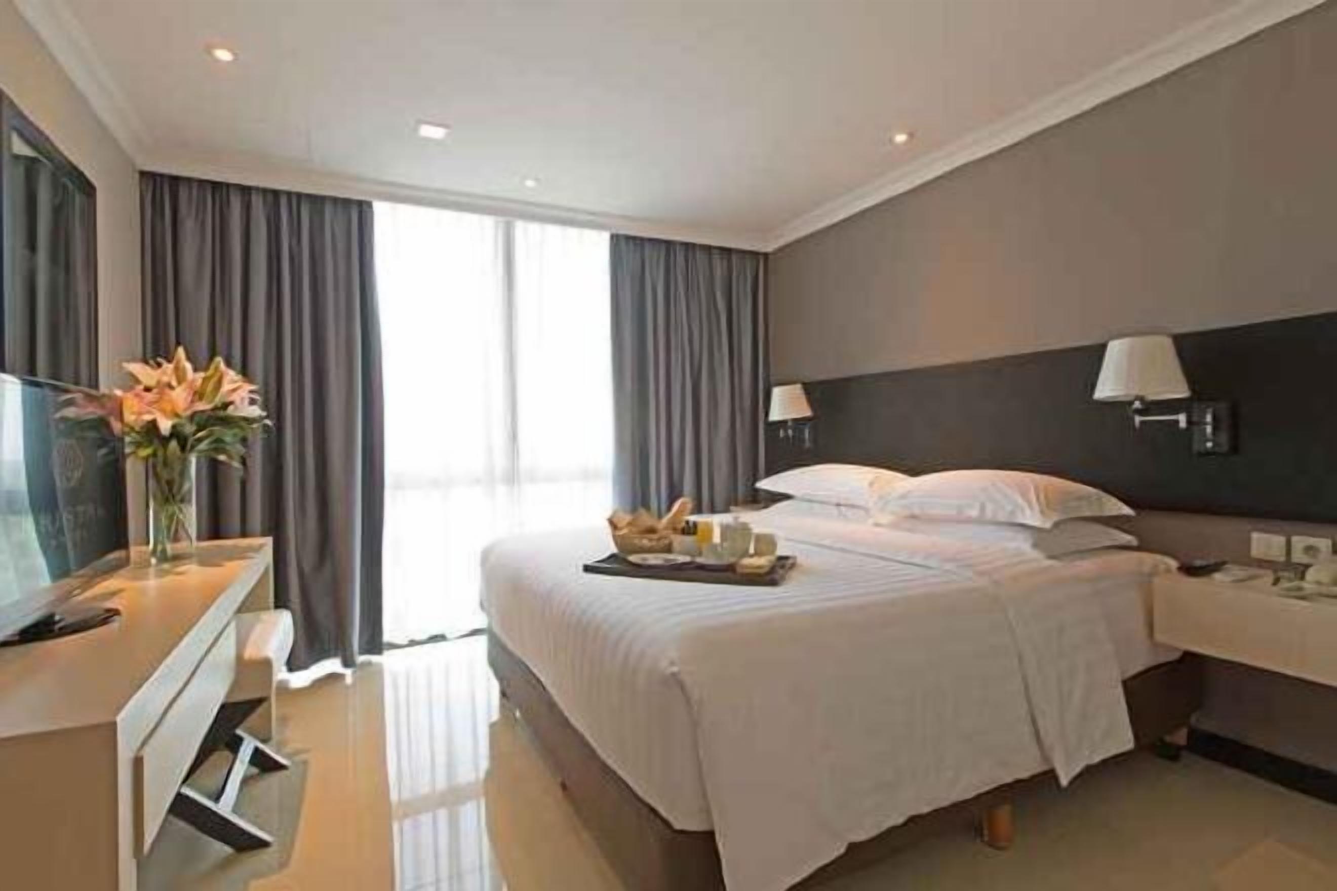 1 habitación, ropa de cama de alta calidad y minibar 