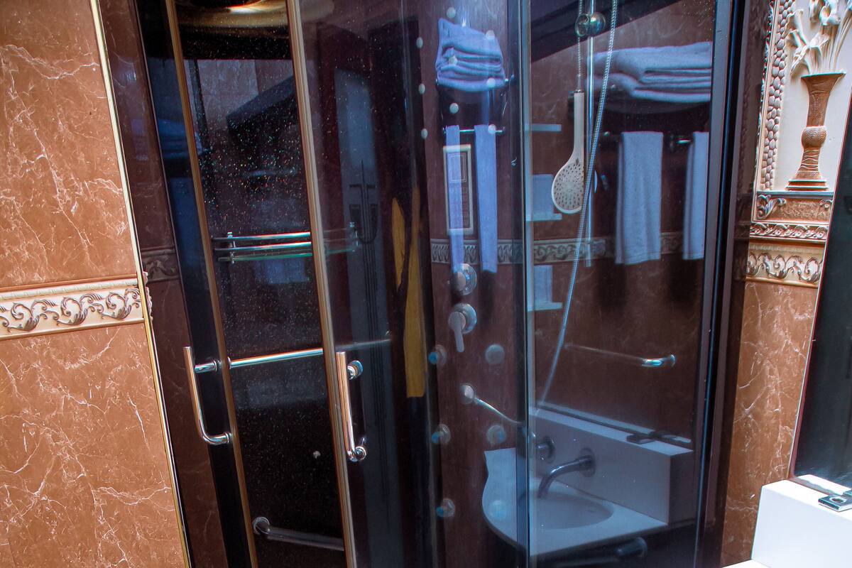 suite, sauna | bathroom | shower, free toiletries, hair dryer, bathrobes