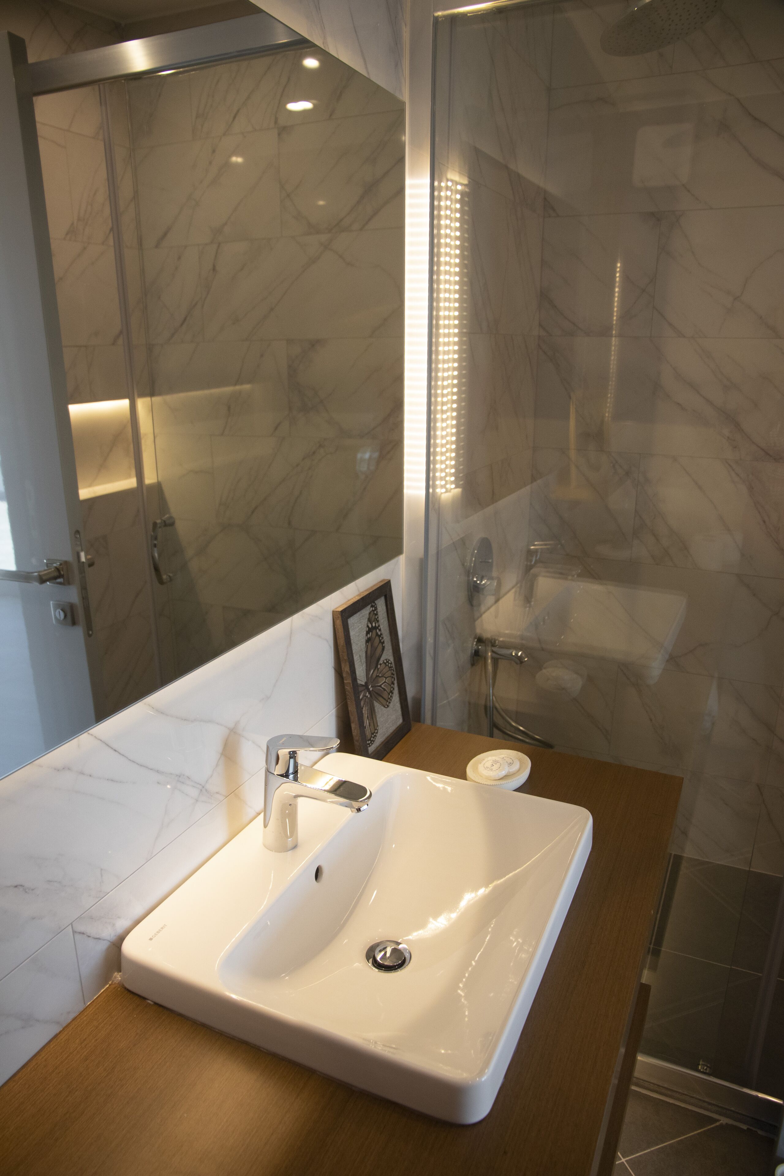 terrace suit 1 | bathroom | shower, rainfall showerhead, hair dryer, bathrobes