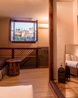 Down comforters, blackout drapes, iron/ironing board, free WiFi