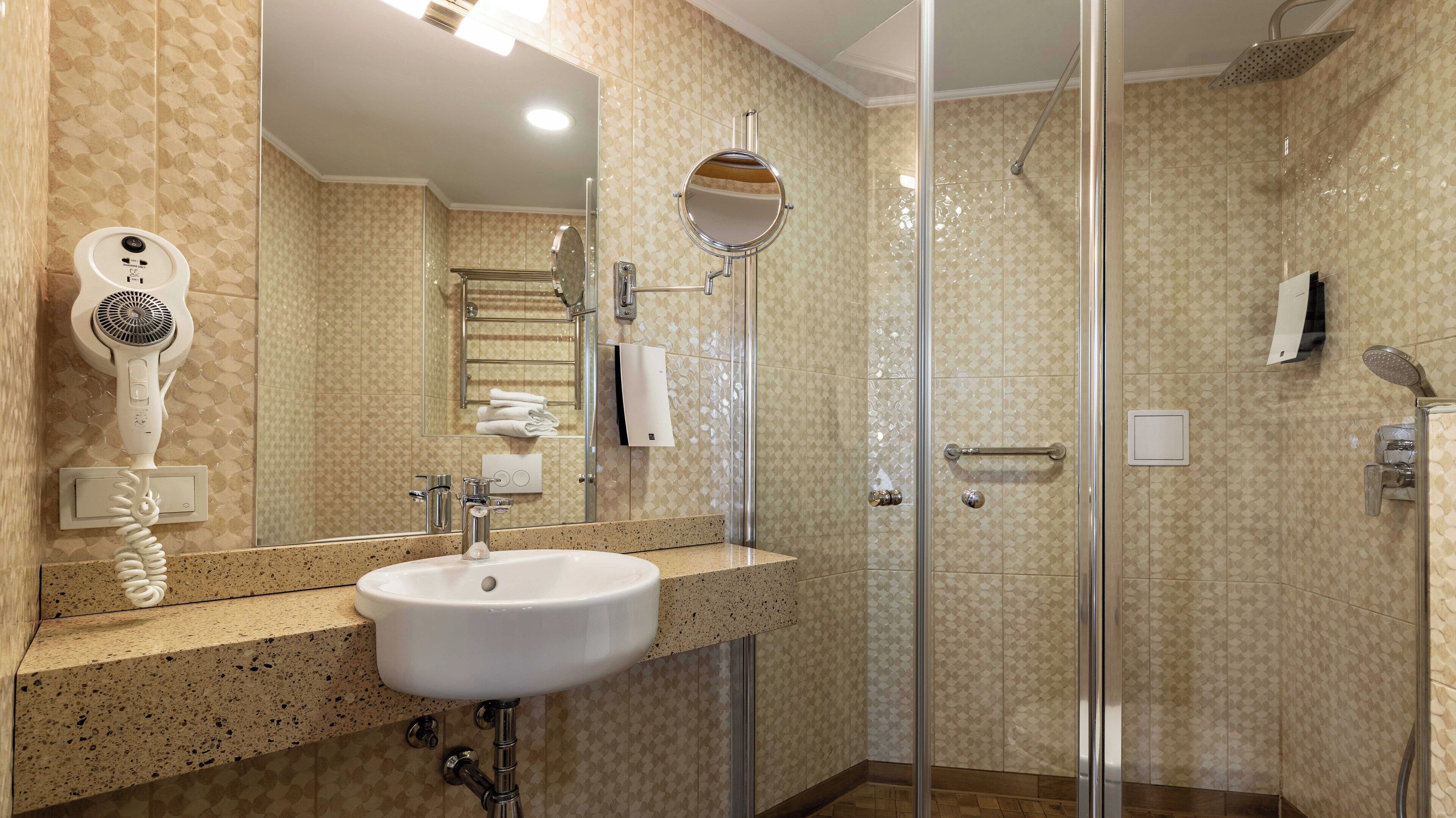 free toiletries, hair dryer, heated floors, towels