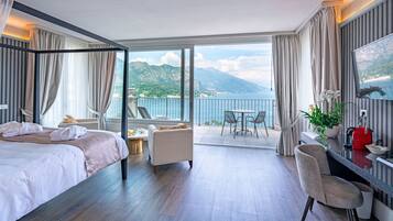 Panoramic Suite, Lake View | Down comforters, minibar, in-room safe, desk