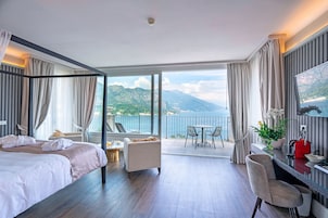 Panoramic Suite, Lake View | Down comforters, minibar, in-room safe, desk