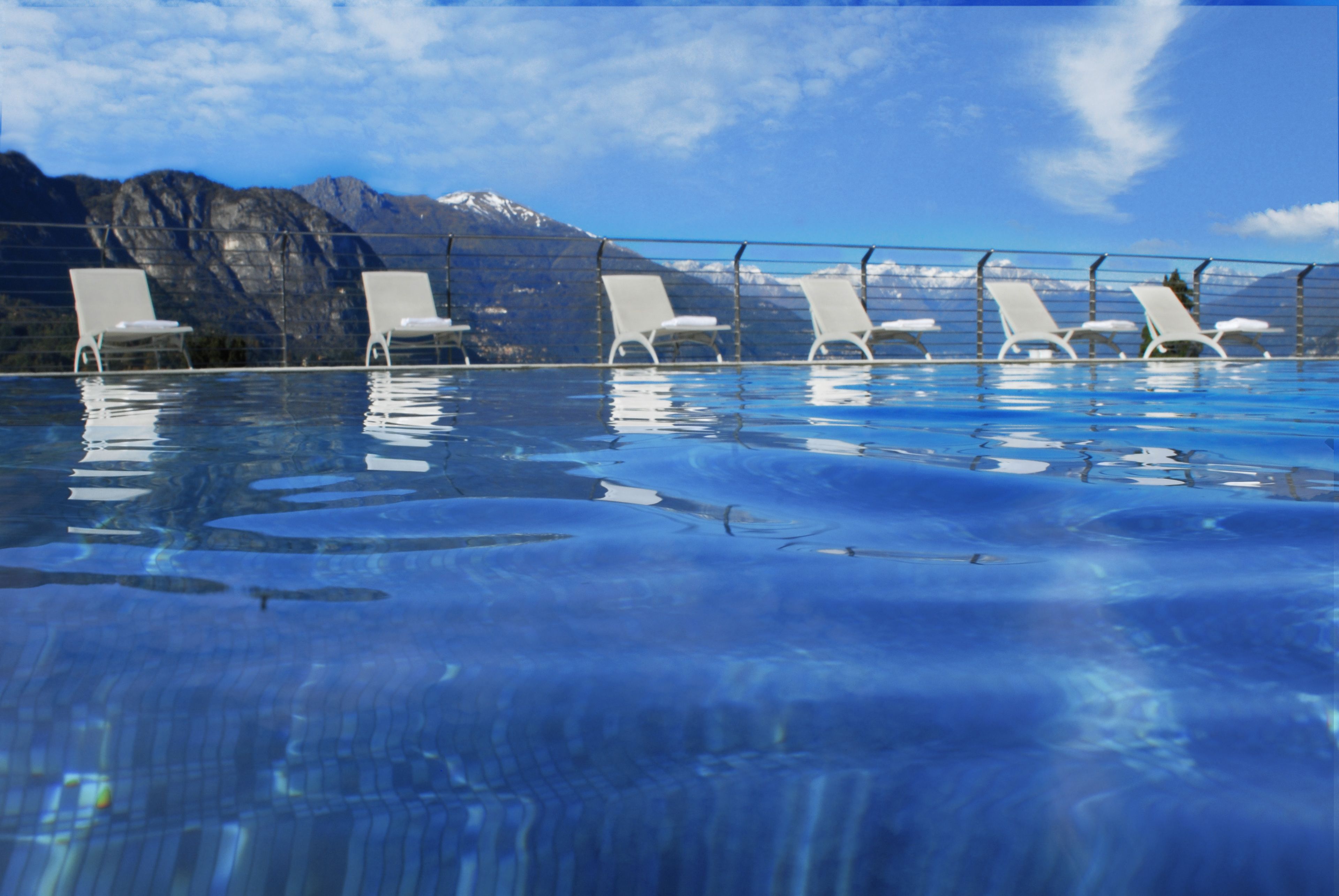 Seasonal outdoor pool, pool umbrellas, pool loungers