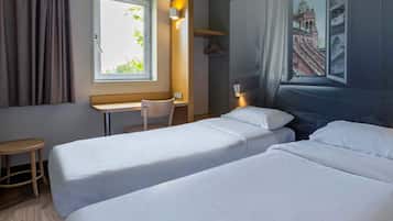 Premium bedding, desk, blackout drapes, soundproofing