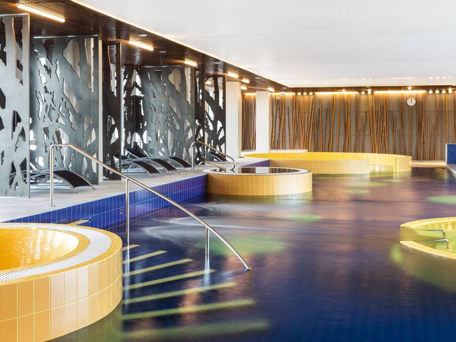 Indoor pool, open 7:00 AM to 10:00 PM, sun loungers