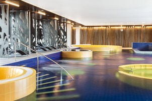 Indoor pool, open 7:00 AM to 10:00 PM, sun loungers